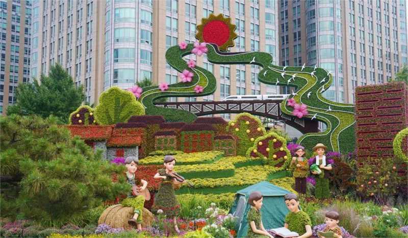 東單東南角的“共同富?！敝黝}花壇.jpg